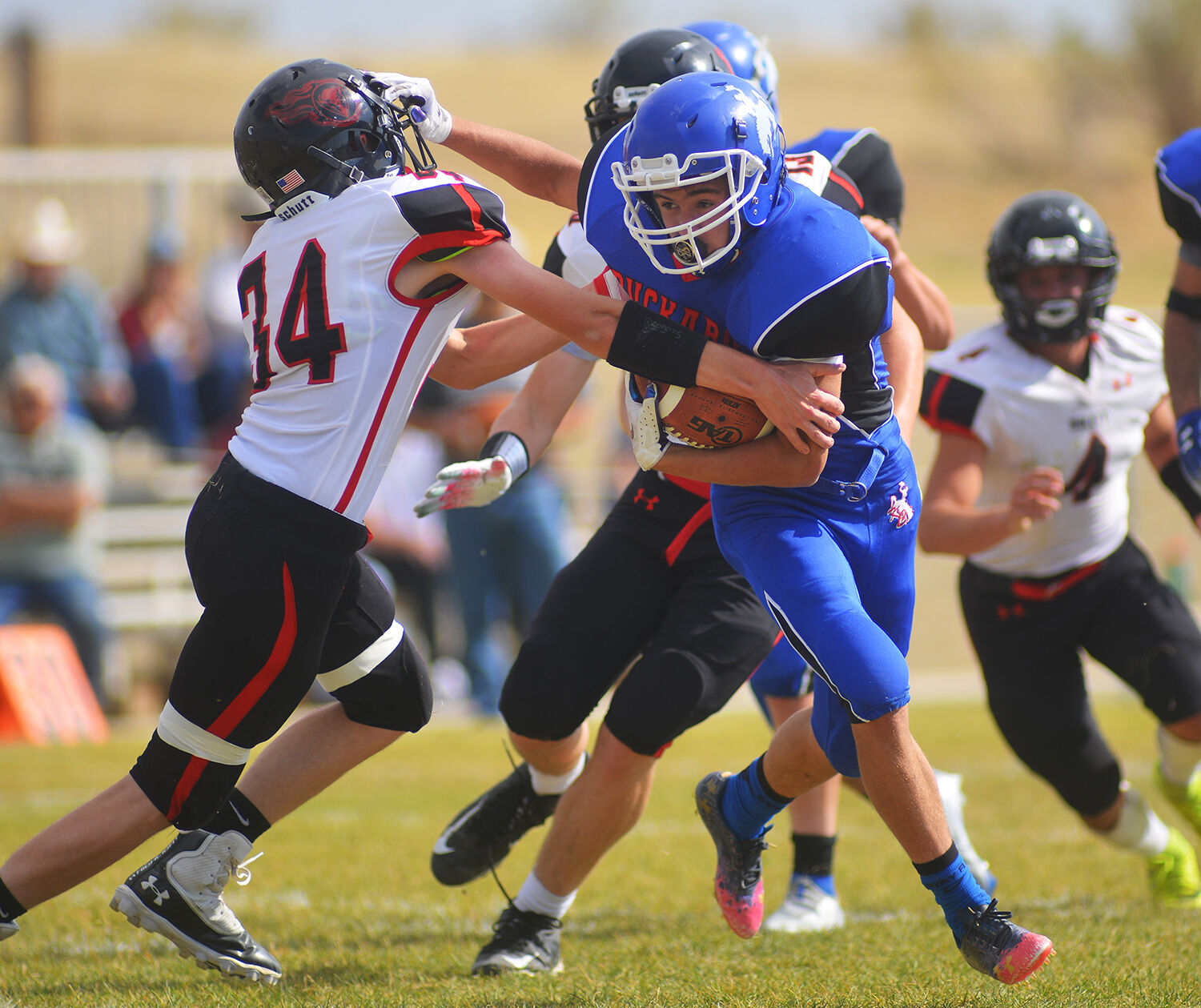Dylan Fauber tries to push through the defense
